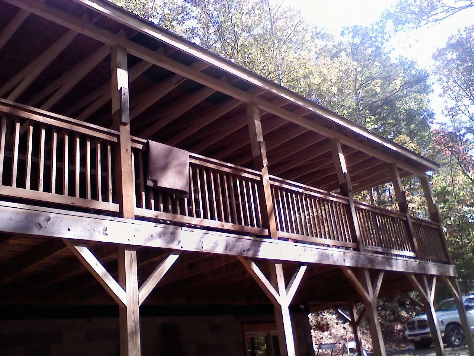 Timber framing under a new elevated porch and deck — Roof Leak Repair in Mascotte by Roofing Brothers